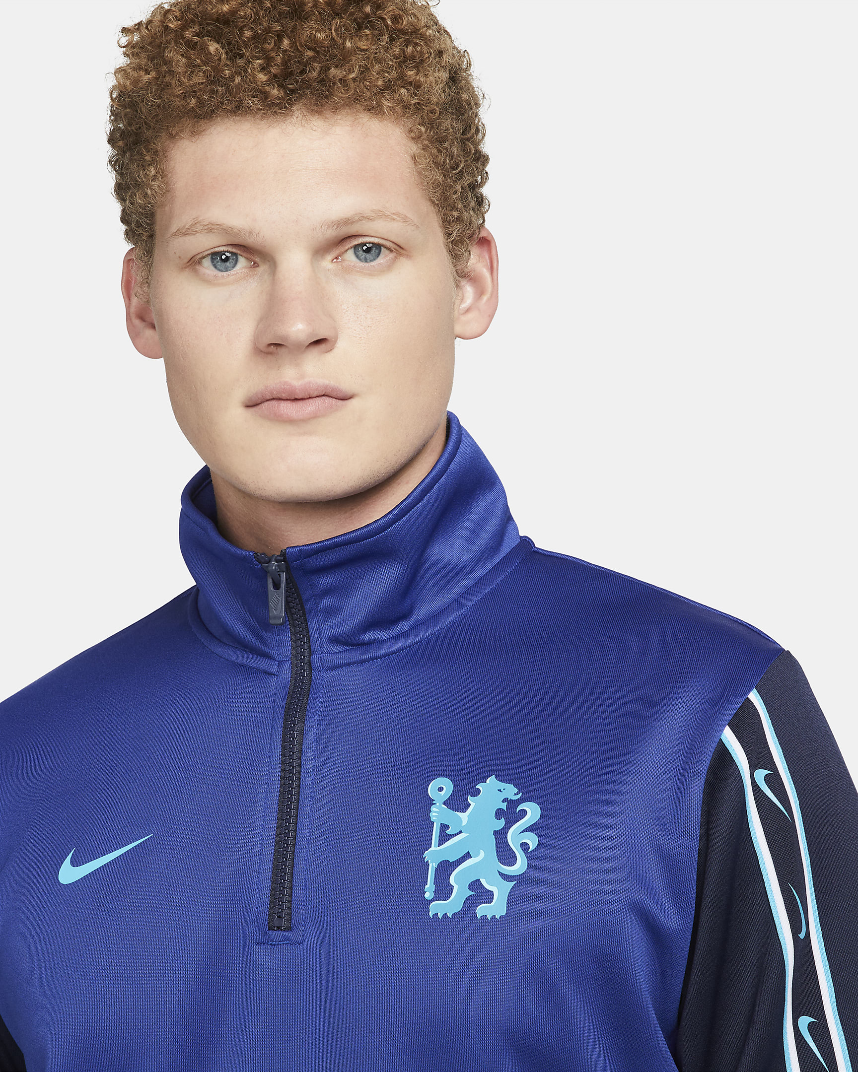 Chelsea F.C. Repeat Men's Nike DriFIT 1/2Zip Top. Nike CA
