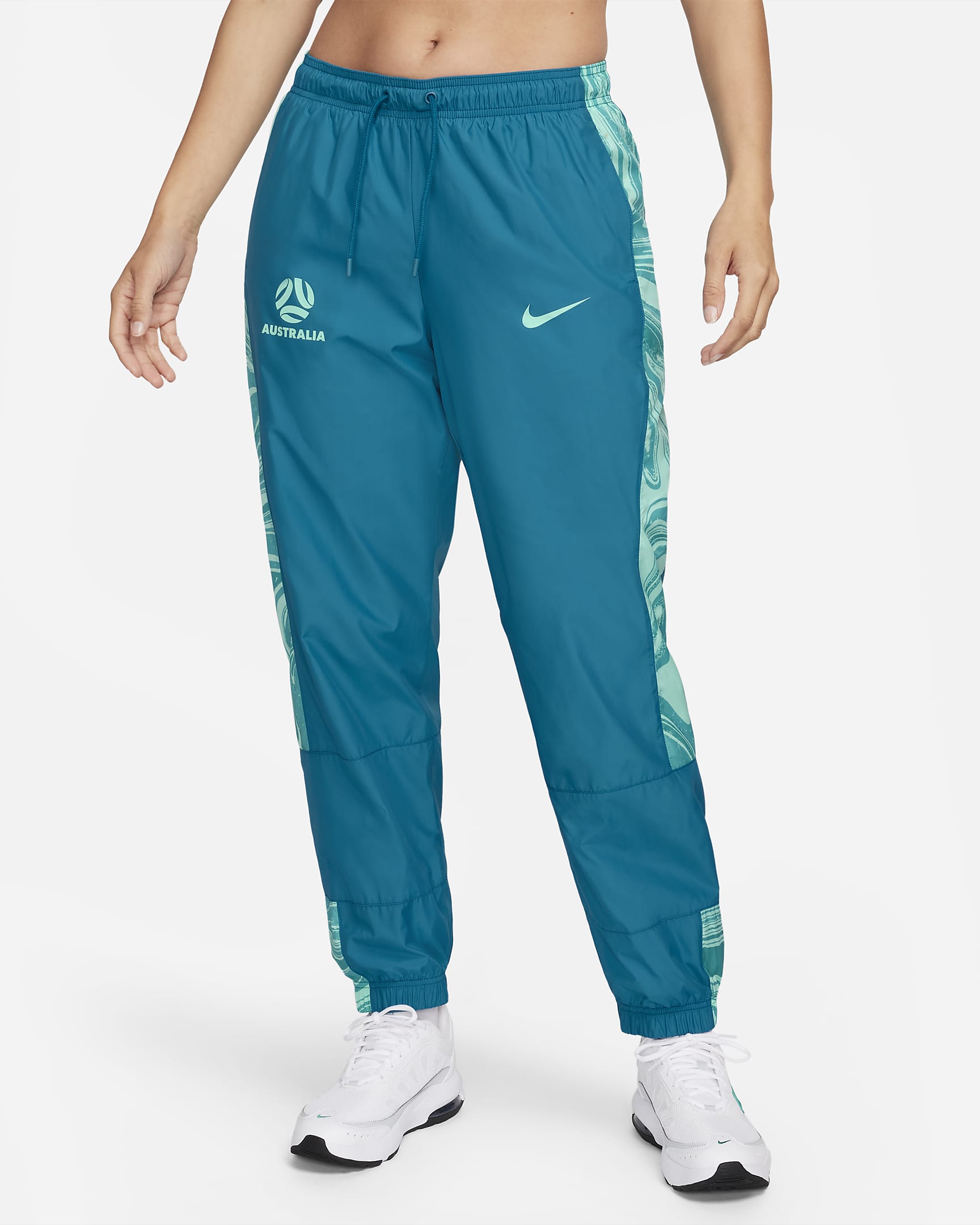 Australia Repel Essential Women's Nike MidRise Graphic Joggers. Nike BE
