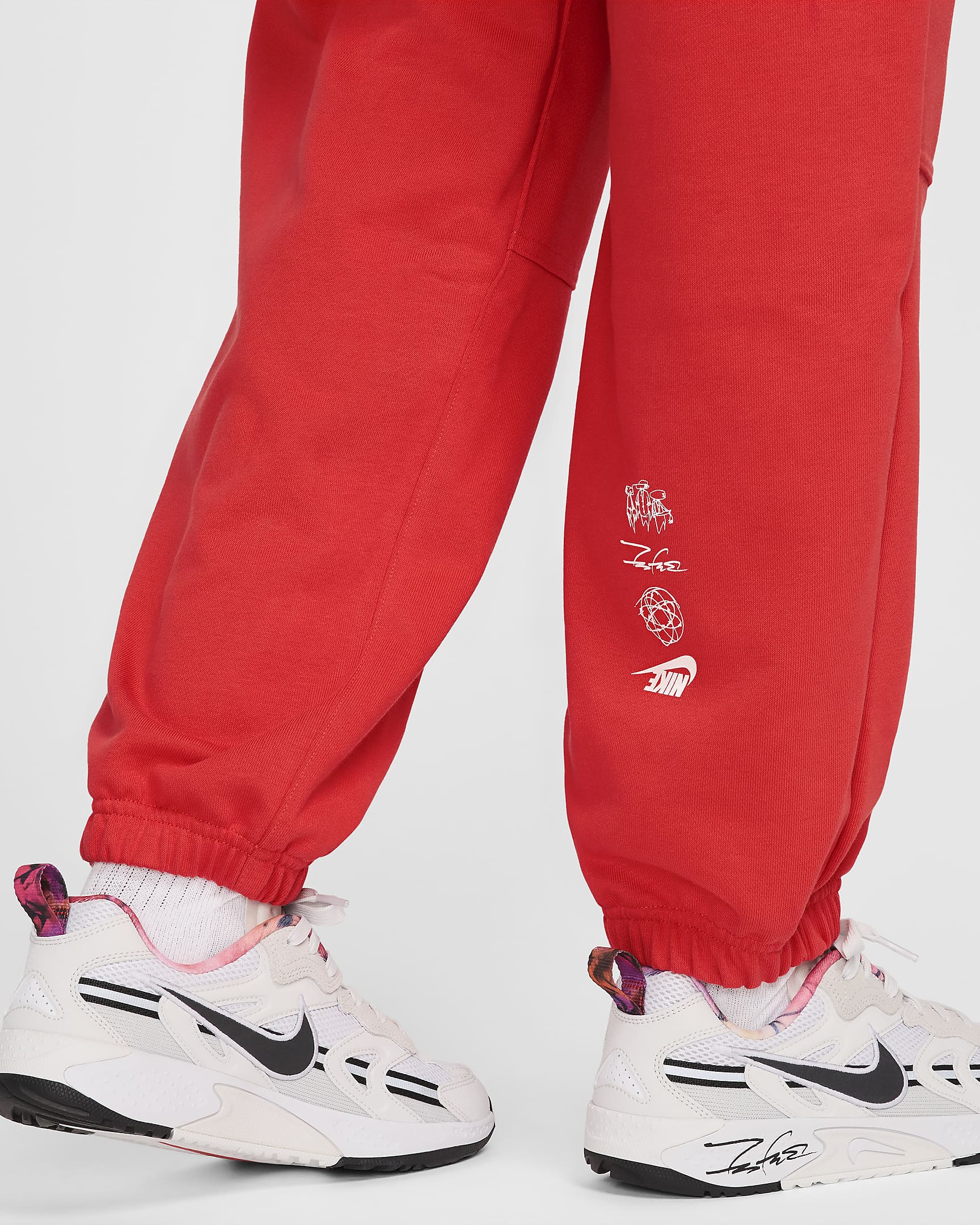 Pants de French Terry oversized de tiro medio para mujer Nike Sportswear Breaking - Carmesí claro