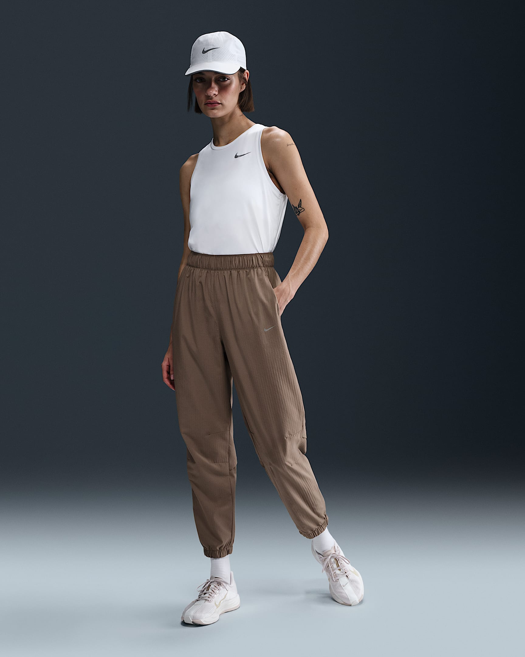 Pantalon de running d'échauffement 7/8 taille mi-haute Nike Dri-FIT Fast pour femme - Mink Brown