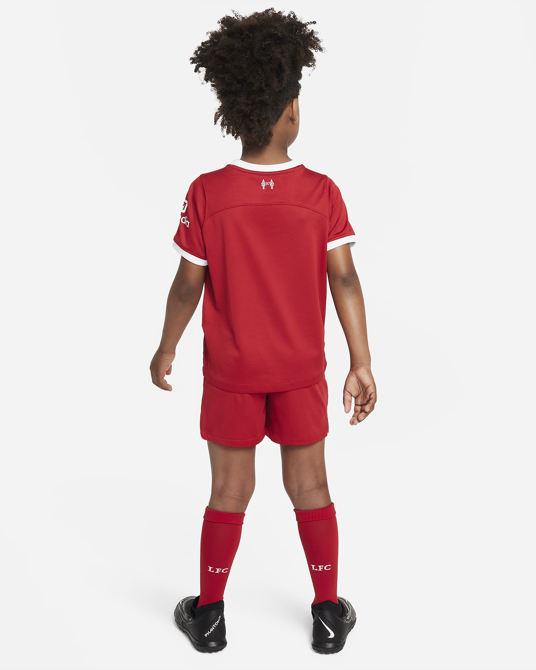 Liverpool F.C. 2023/24 Home Younger Kids' Nike DriFIT 3Piece Kit. Nike SE