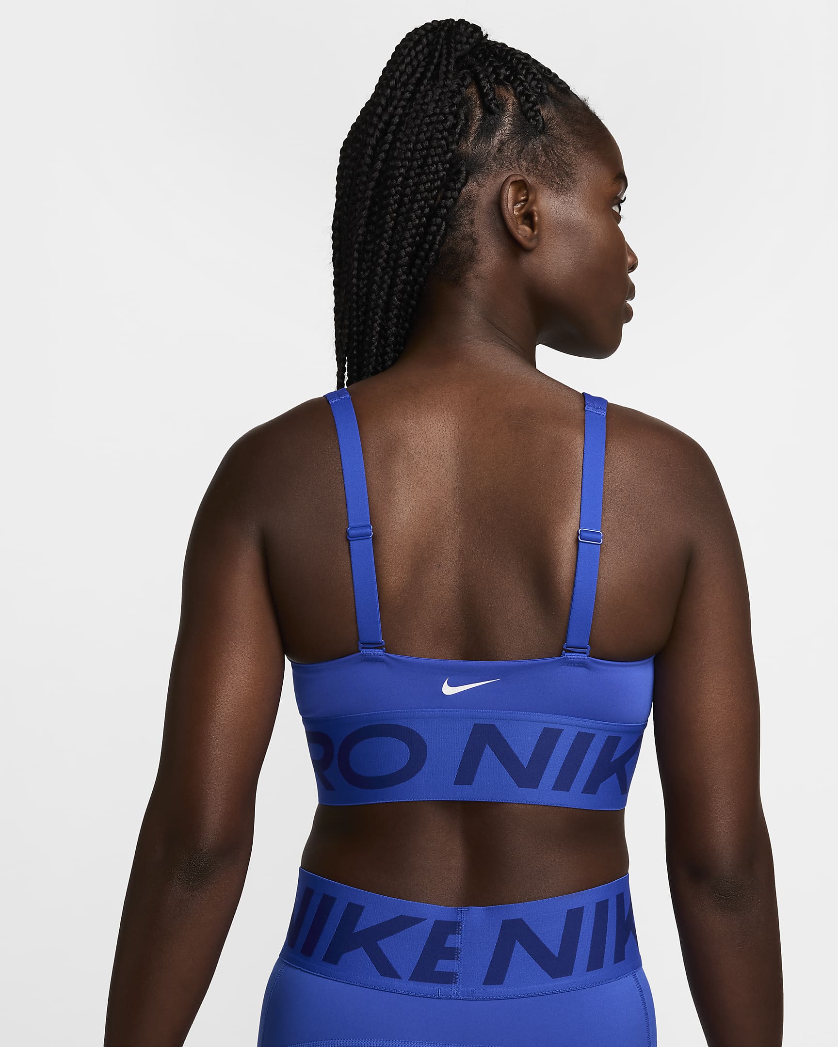 Nike Pro Indy Plunge közepes tartást adó, párnázott női sportmelltartó - Hyper Royal/Deep Royal Blue/Fehér