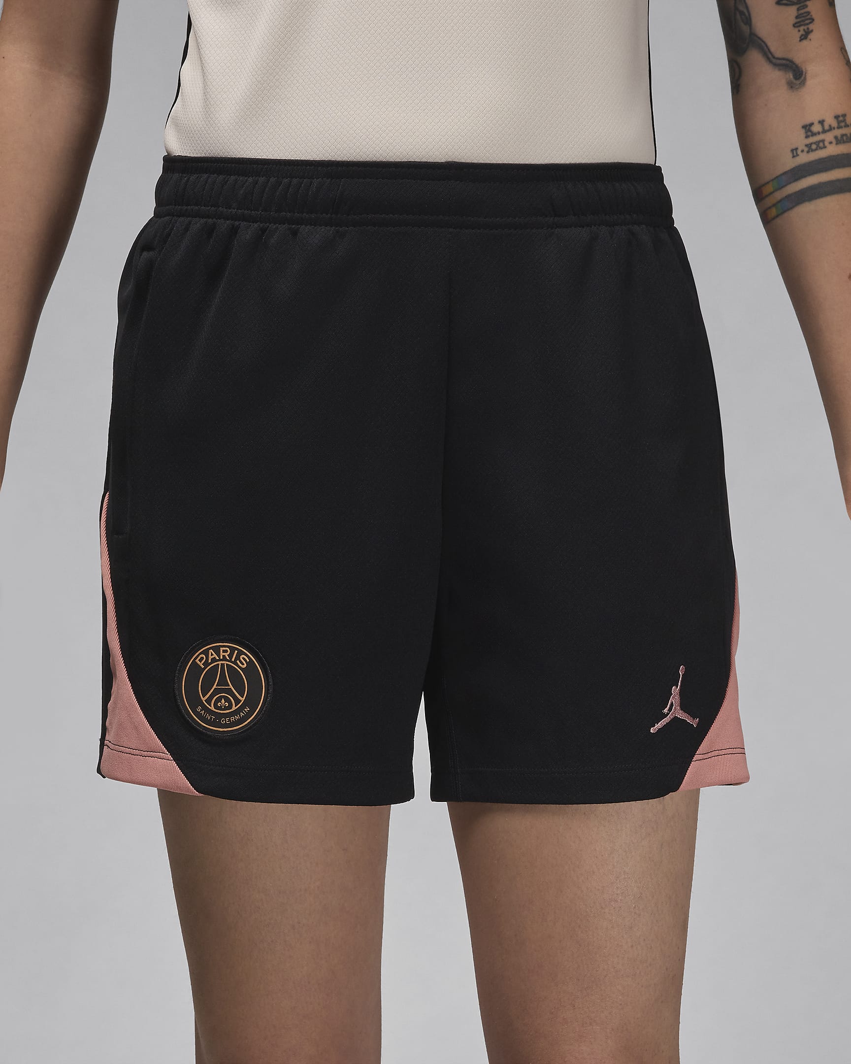 Damskie dzianinowe spodenki piłkarskie Jordan Dri-FIT Paris Saint-Germain Strike (wersja trzecia) - Czerń/Rust Pink/Rust Pink