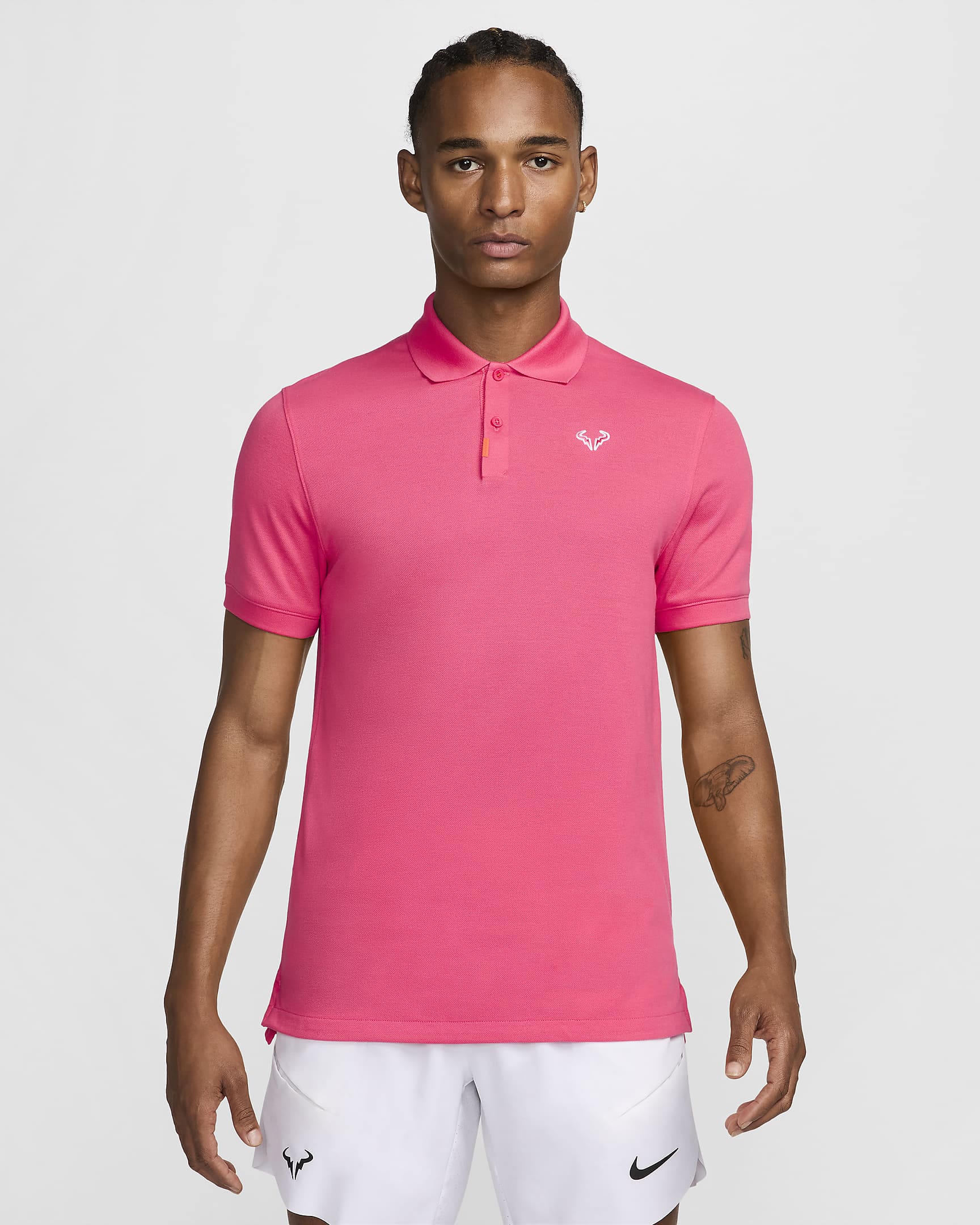 The Nike Polo Rafa Herren-Poloshirt in schmaler Passform - Aster Pink/Weiß