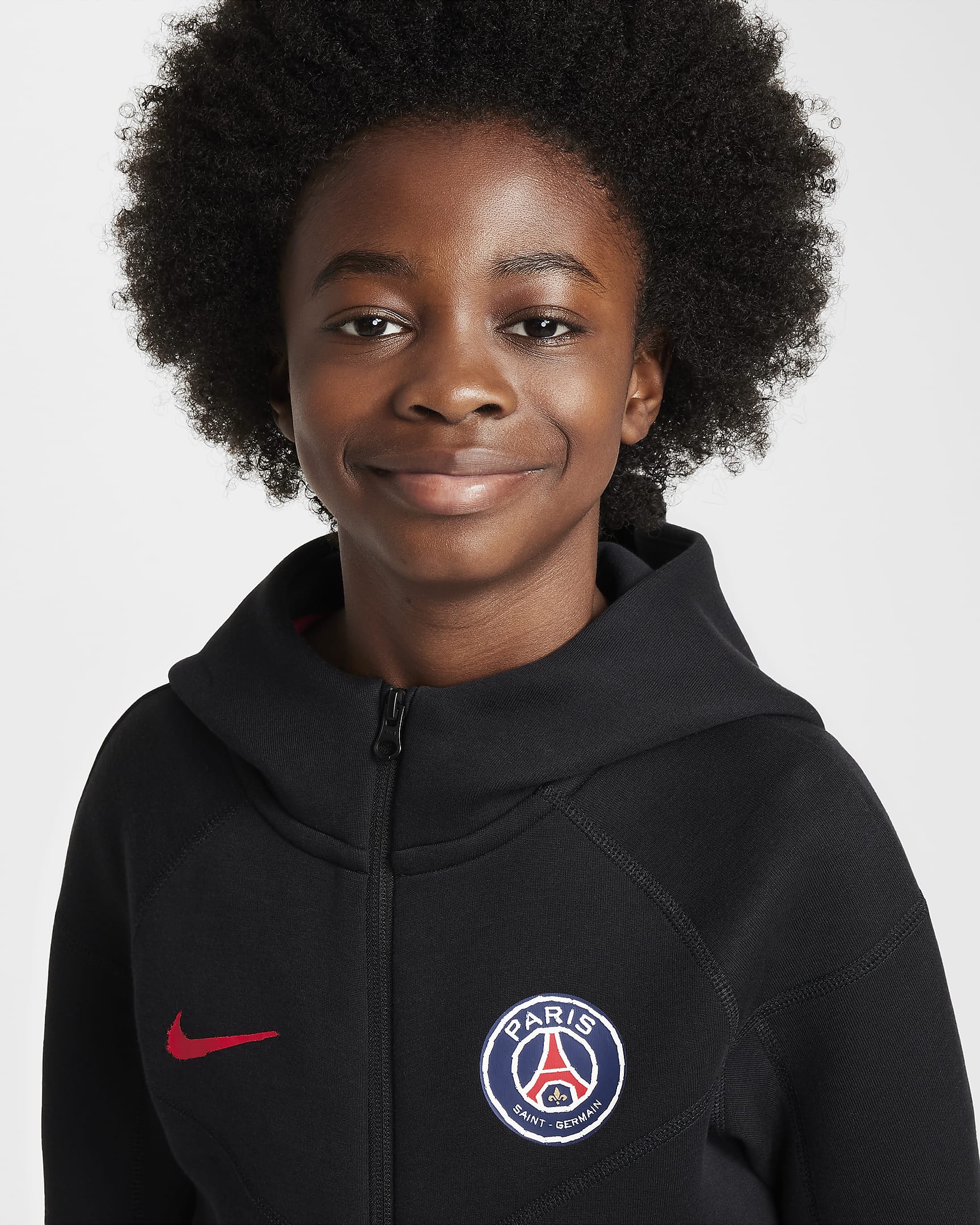 Paris Saint-Germain Tech Fleece Nike fotballhettejakke til store barn (gutt) - Svart/University Red