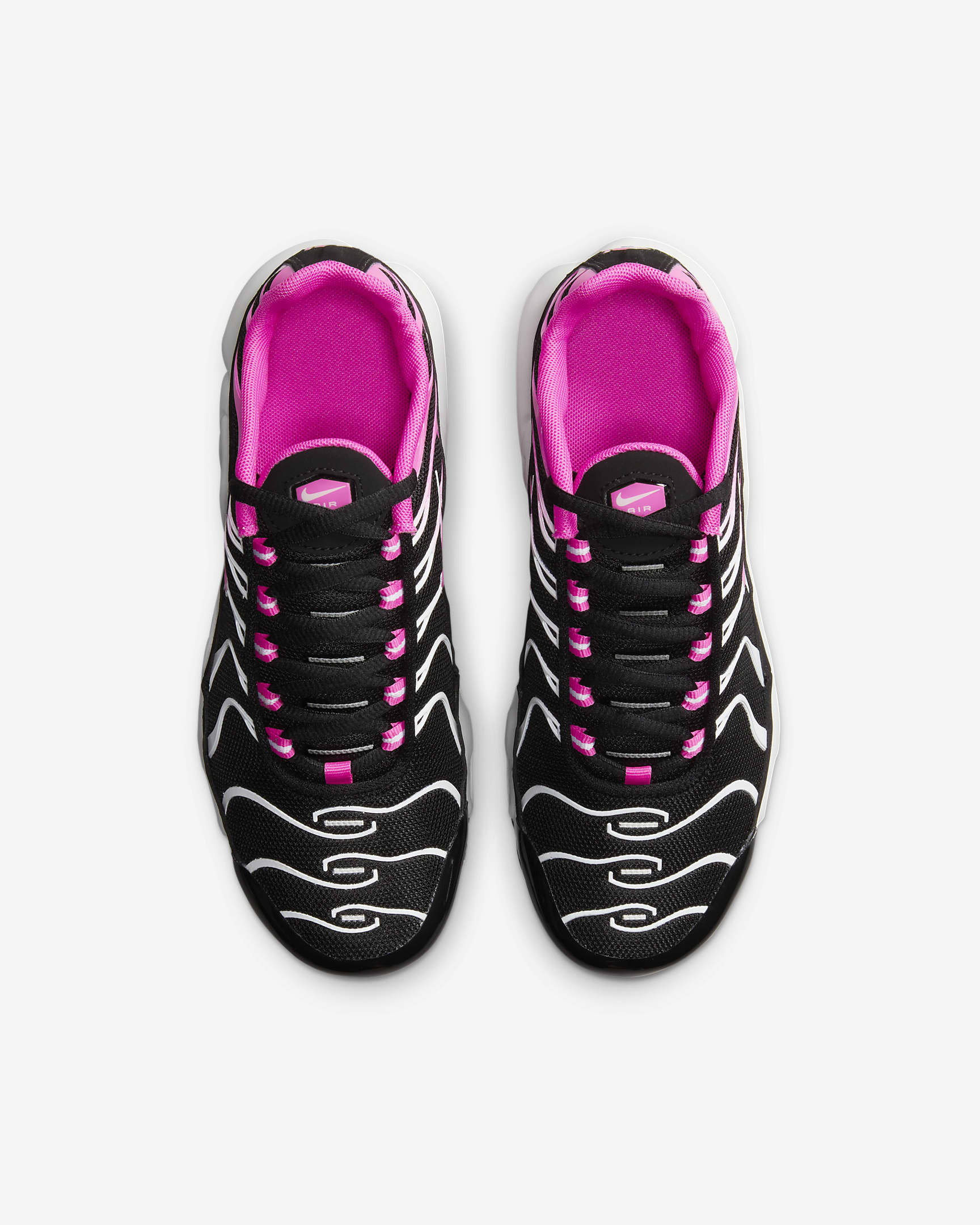 Nike Air Max Plus-sko til større børn - sort/hvid/Laser Fuchsia