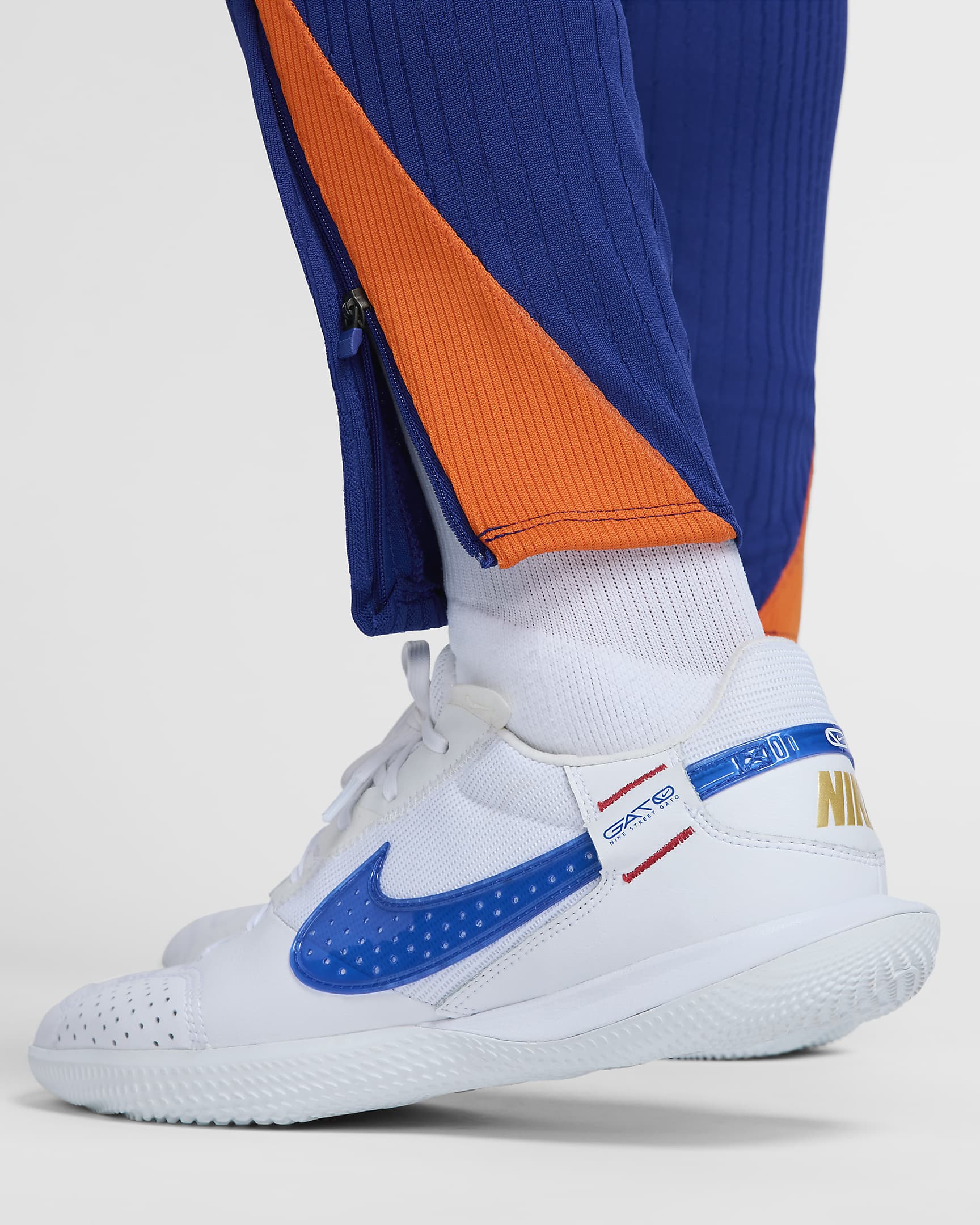 Pantalon de foot en maille Nike Dri-FIT ADV Pays-Bas Strike Elite pour homme - Deep Royal Blue/Safety Orange/Safety Orange