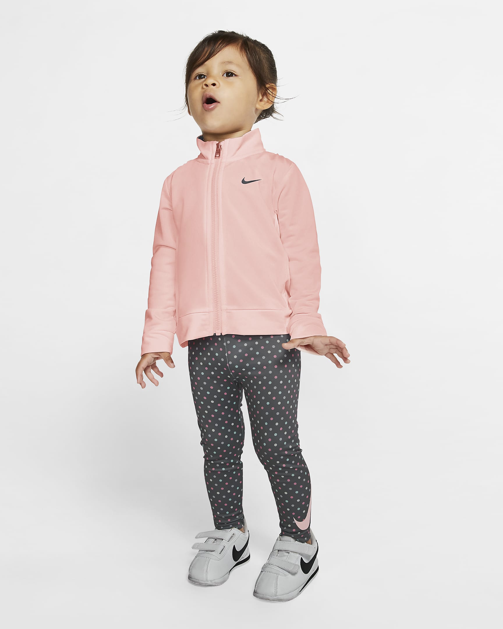 Conjunto de leggings y chamarra para bebé Nike (12-24M). Nike.com
