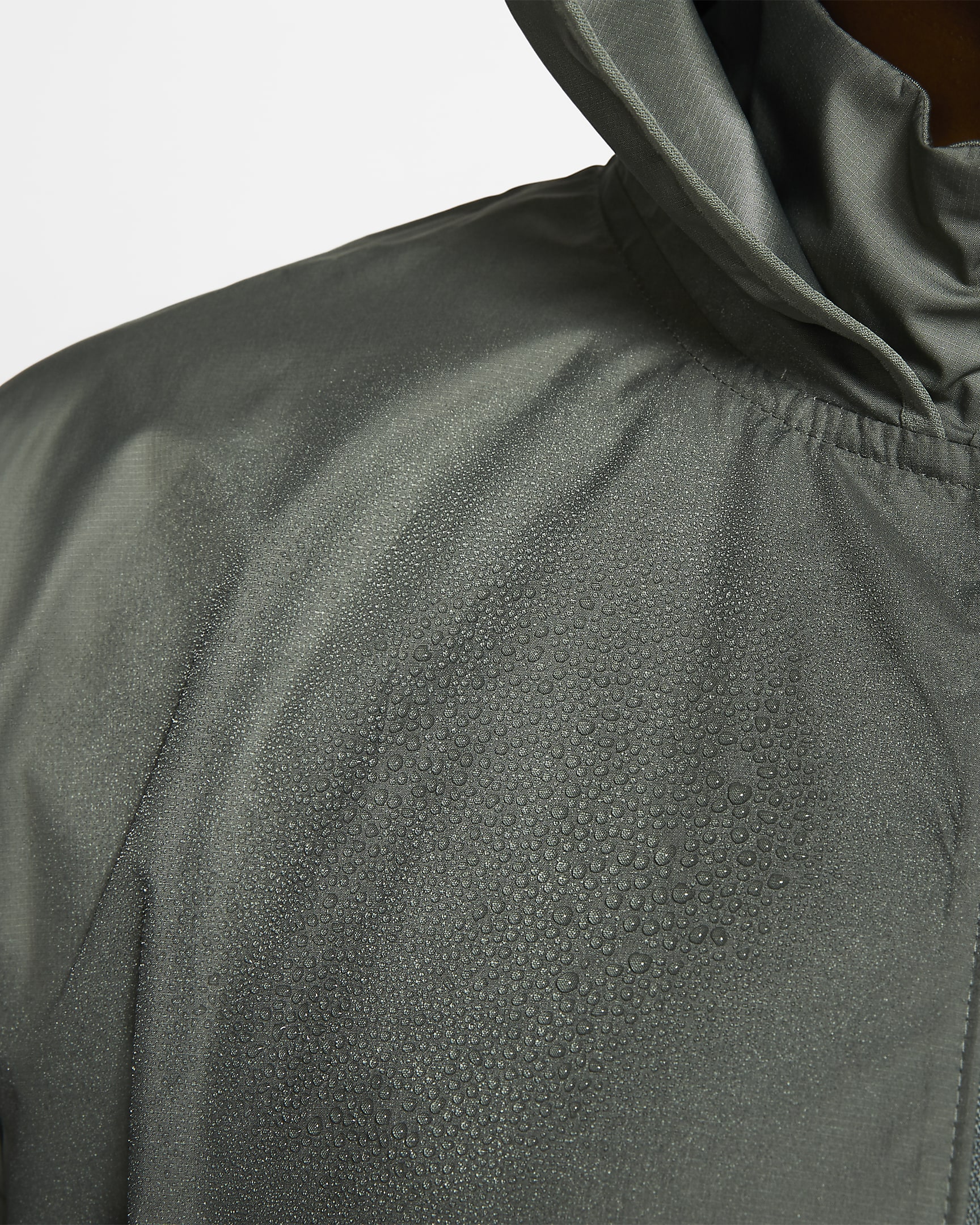 Nike Essential Women's Packable Running Rain Jacket.