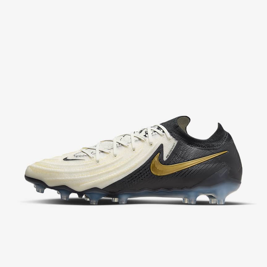nike boots gold and black