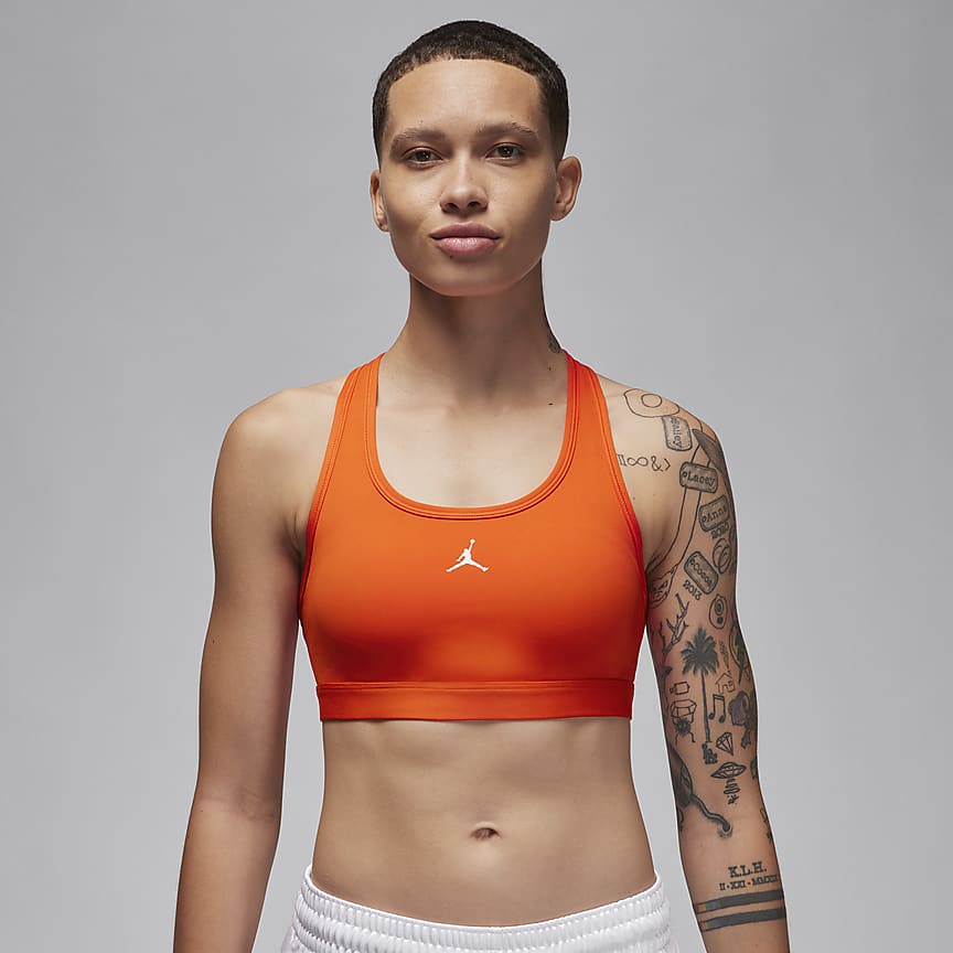 Nike Training Swoosh dri fit padded medium support sports bra in orange