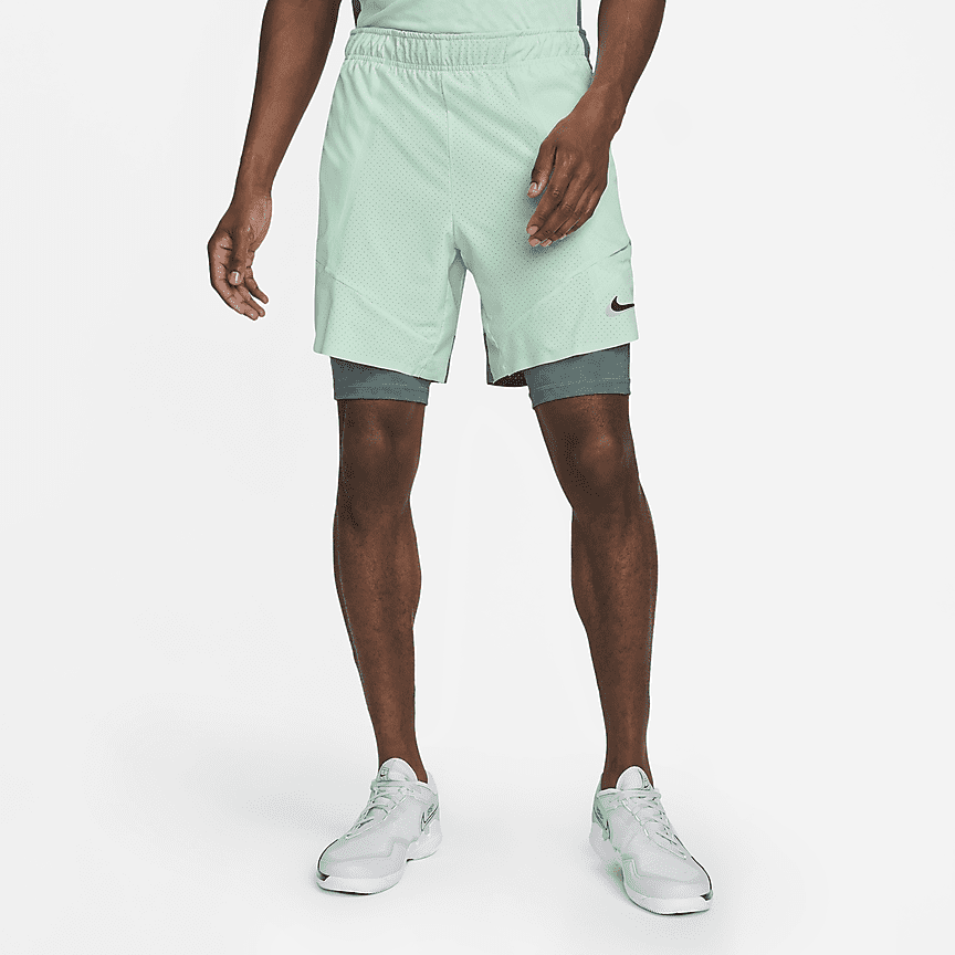 NikeCourt Dri-FIT Slam Pantalón corto de tenis 2 en 1 - Hombre. Nike ES