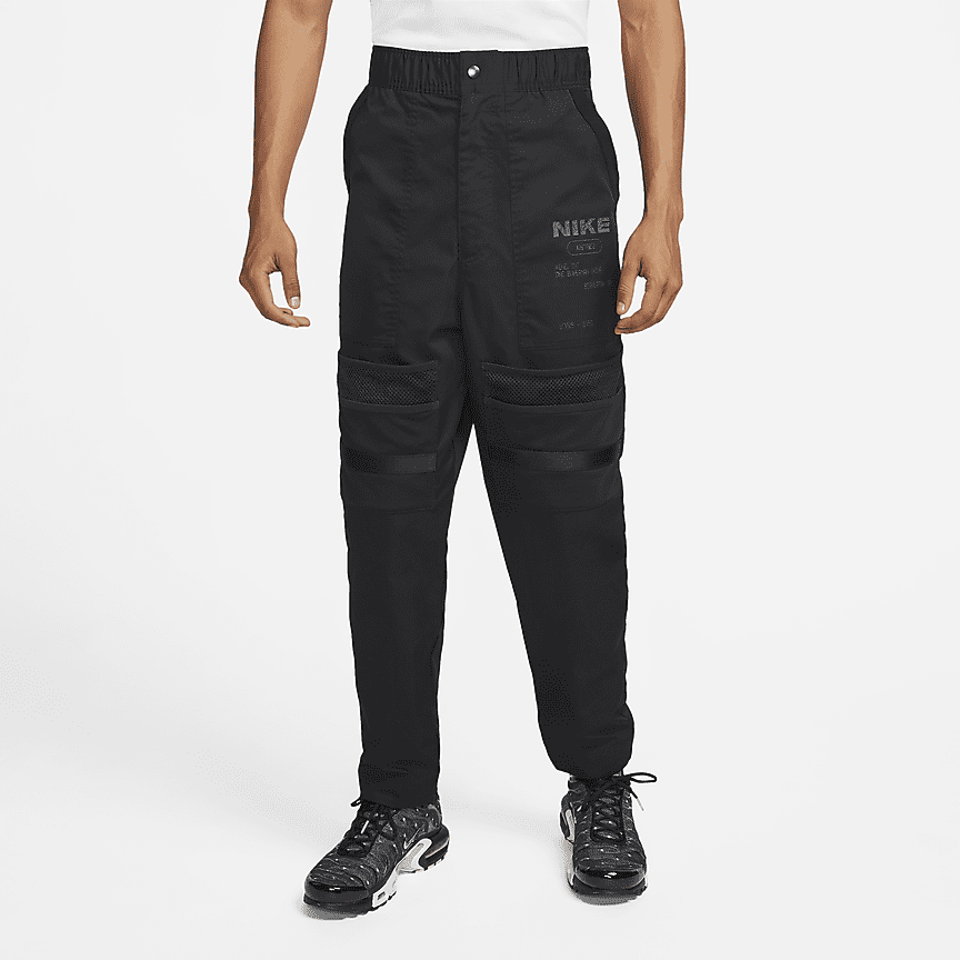 Pantaloni cargo in tessuto non foderati Nike Sportswear Tech Essentials -  Uomo. Nike CH