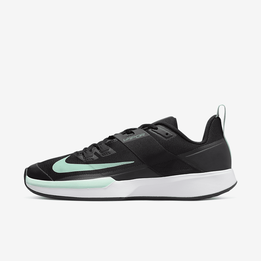 green nike athletic shoes