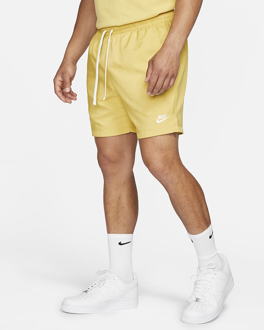 nike woven shorts saturn gold