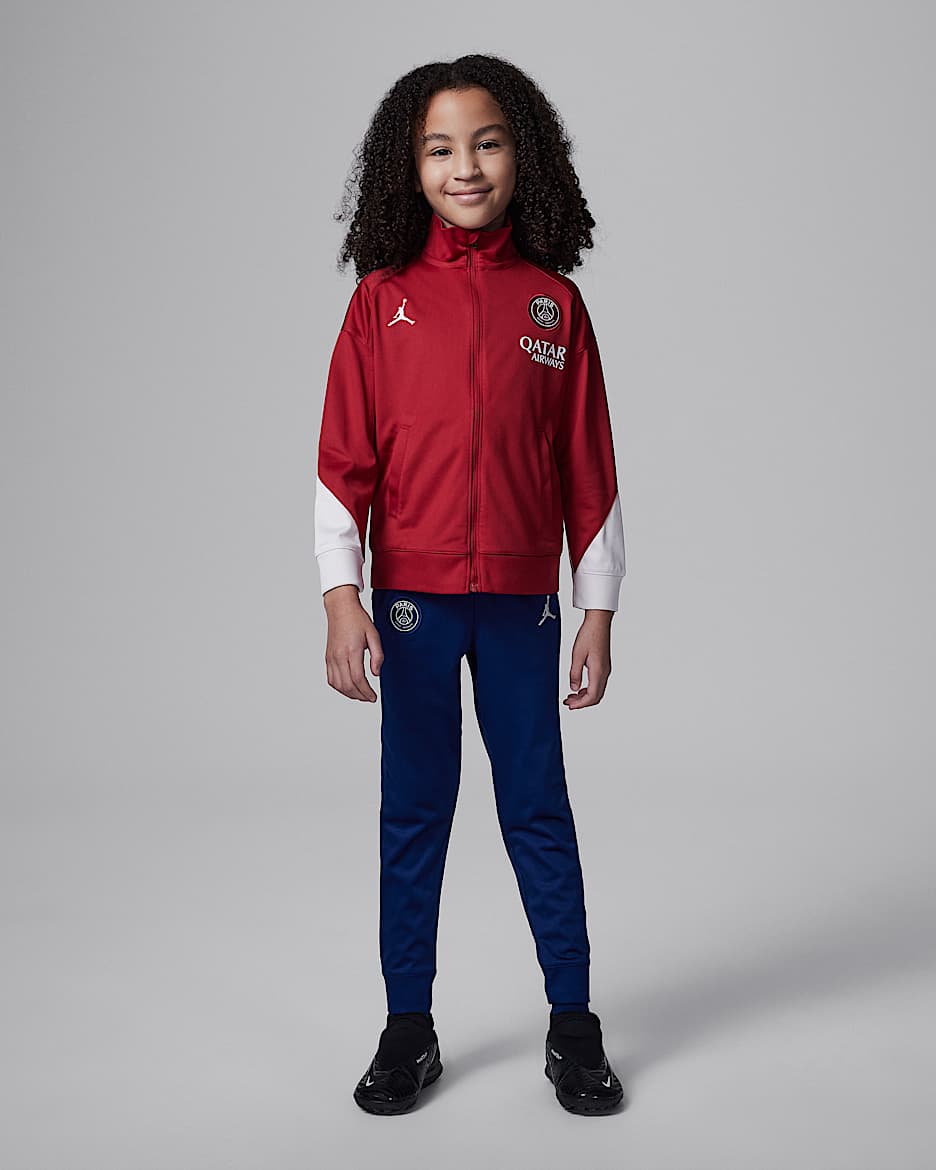 Paris Saint-Germain Strike Fourth Younger Kids' Jordan Dri-FIT Football Knit Tracksuit - Wings Jordan Red/Blue Void/Phantom/Phantom