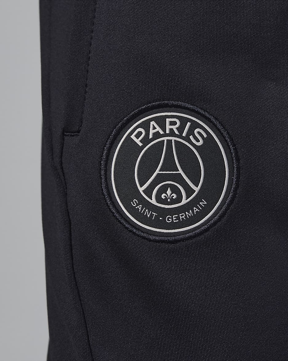 Paris Saint-Germain Strike Third Jordan Dri-FIT Strick-Fußballhose für ältere Kinder - Schwarz/Schwarz/Stone