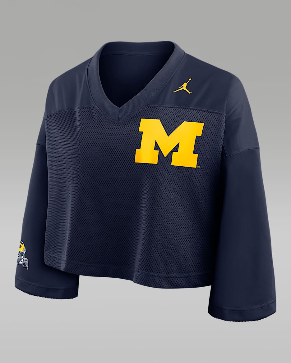 Top cropped universitario marca Jordan Dri-FIT para mujer Michigan Jersey - Azul marino