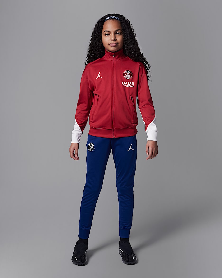 Paris Saint-Germain Strike Fourth Older Kids' Jordan Dri-FIT Football Knit Tracksuit - Wings Jordan Red/Blue Void/Phantom/Phantom
