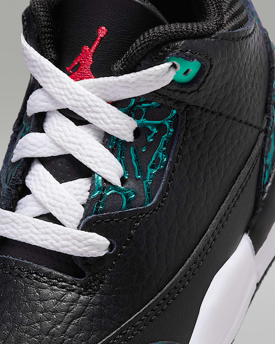 black and turquoise jordans