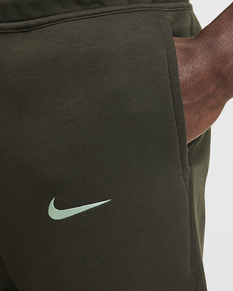 Męskie joggery piłkarskie Nike Tottenham Hotspur Tech Fleece (wersja trzecia) - Sequoia/Enamel Green