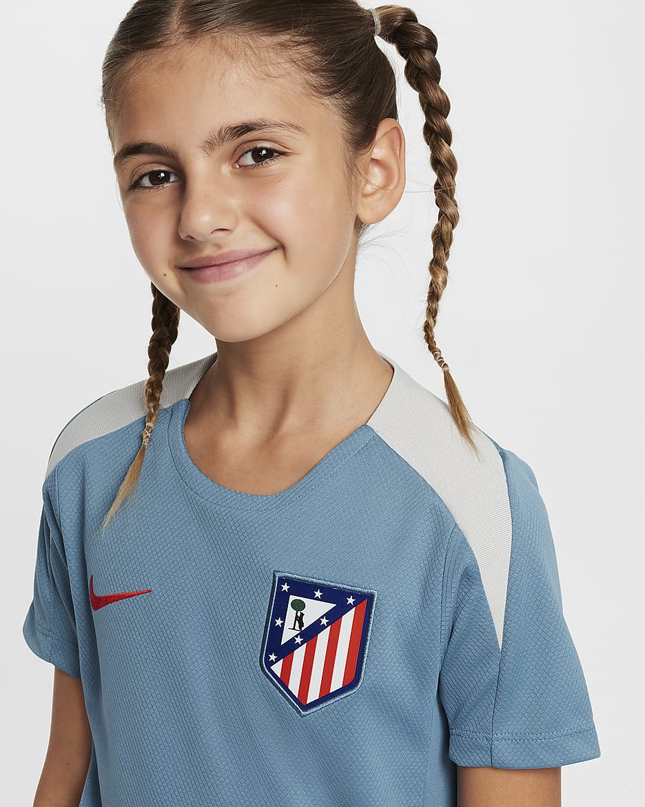 Atlético de Madrid Strike Nike Dri-FIT knit voetbaltop met korte mouwen voor kids - Noise Aqua/Light Iron Ore/Light Crimson