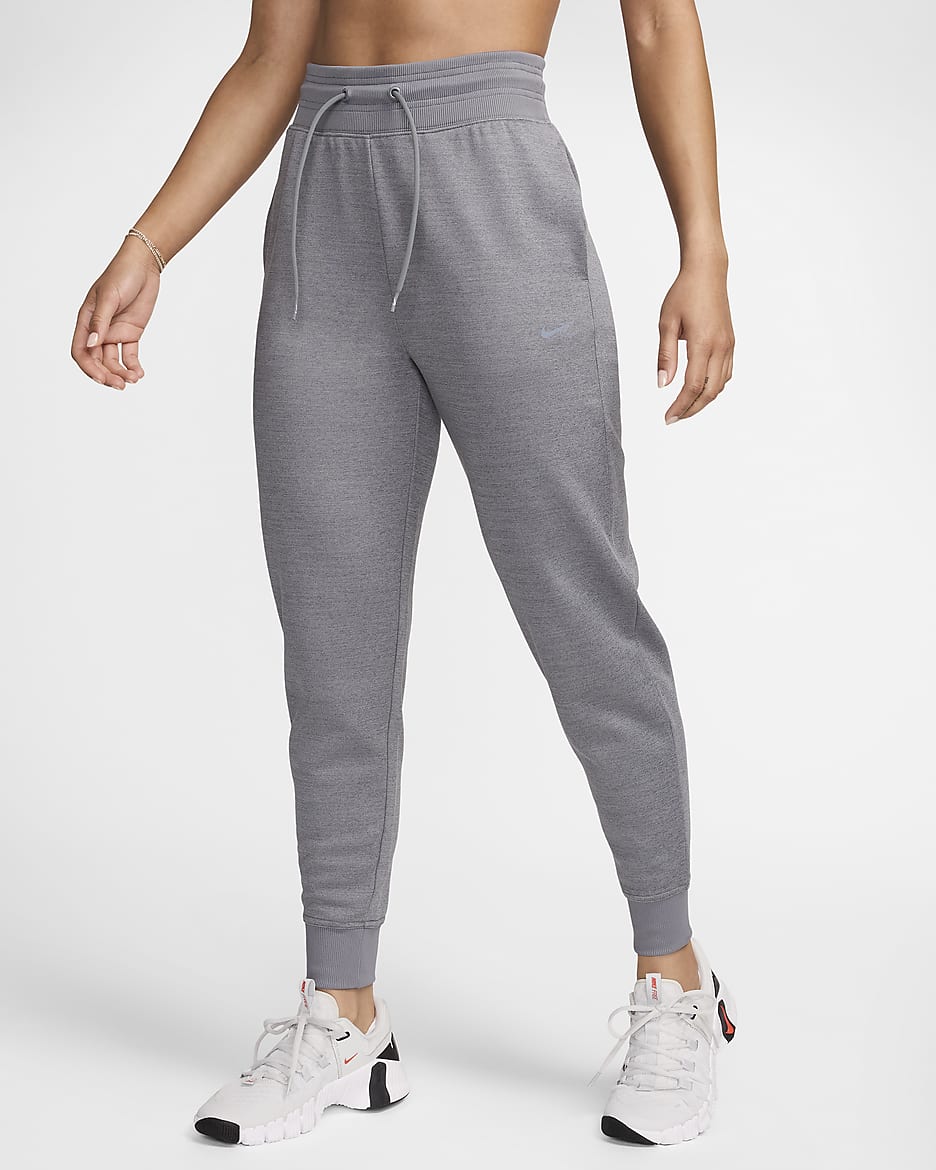 Joggers de tiro alto de 7/8 para mujer Nike Therma-FIT One - Carbono jaspeado/Blanco