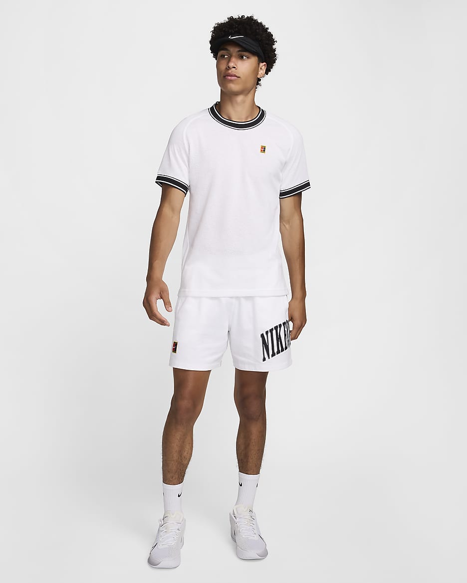 Haut de tennis à manches courtes NikeCourt Heritage pour homme - Blanc/Noir