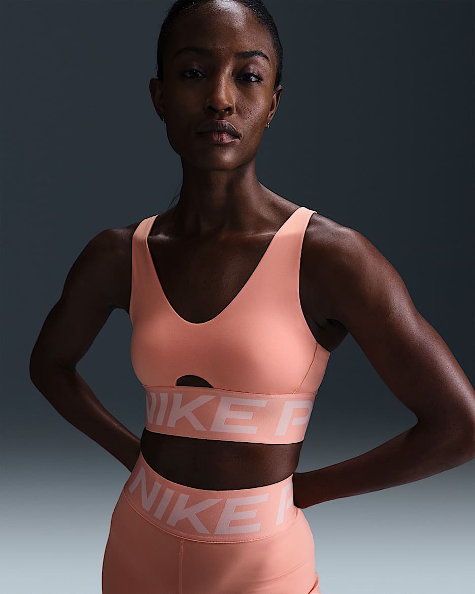 Nike Pro Indy Plunge Women's Medium-Support Padded Sports Bra - Apricot Agate/Washed Coral/White