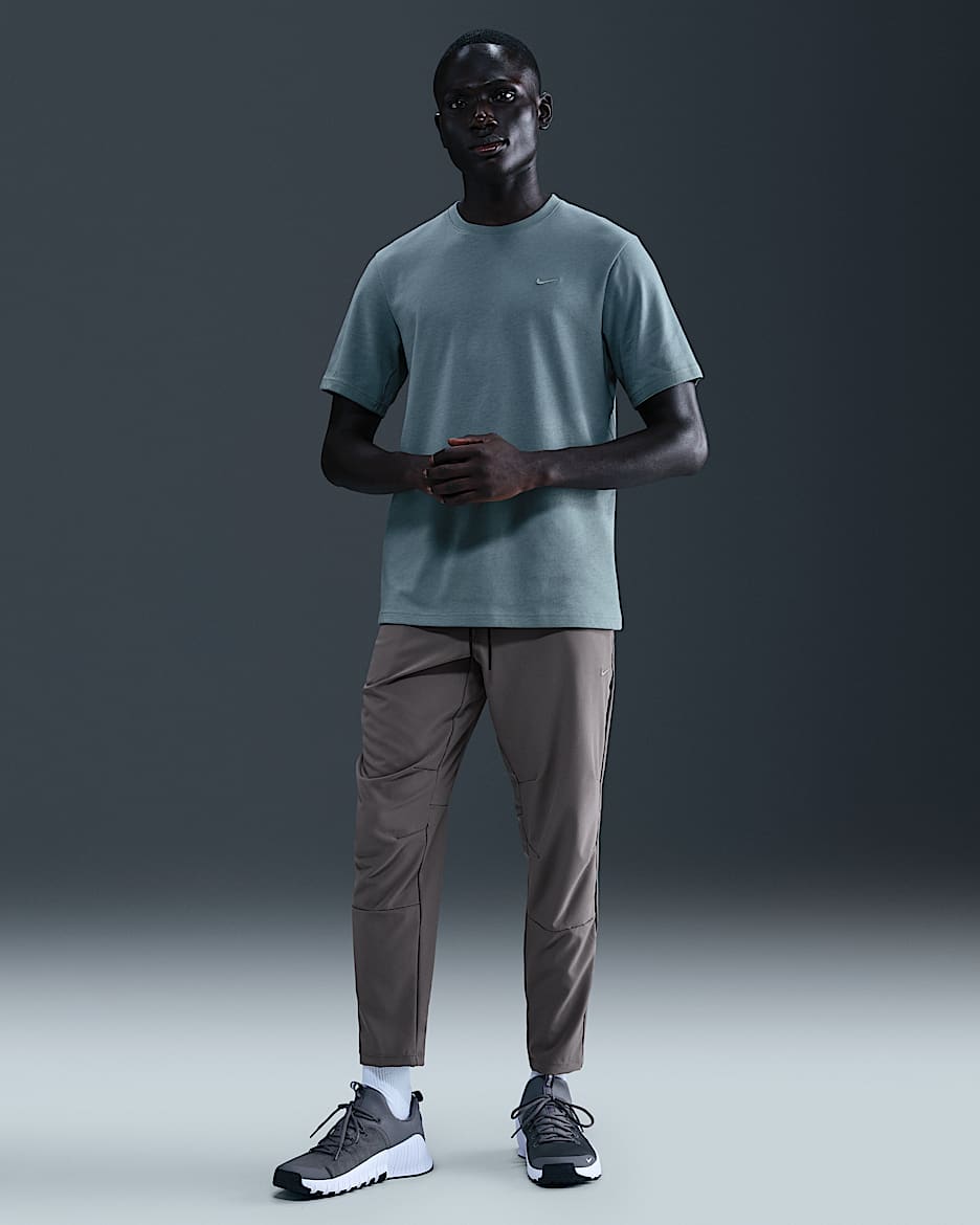 Nike Unlimited Men's Dri-FIT Tapered Leg Versatile Pants - Cave Stone/Black/Cave Stone