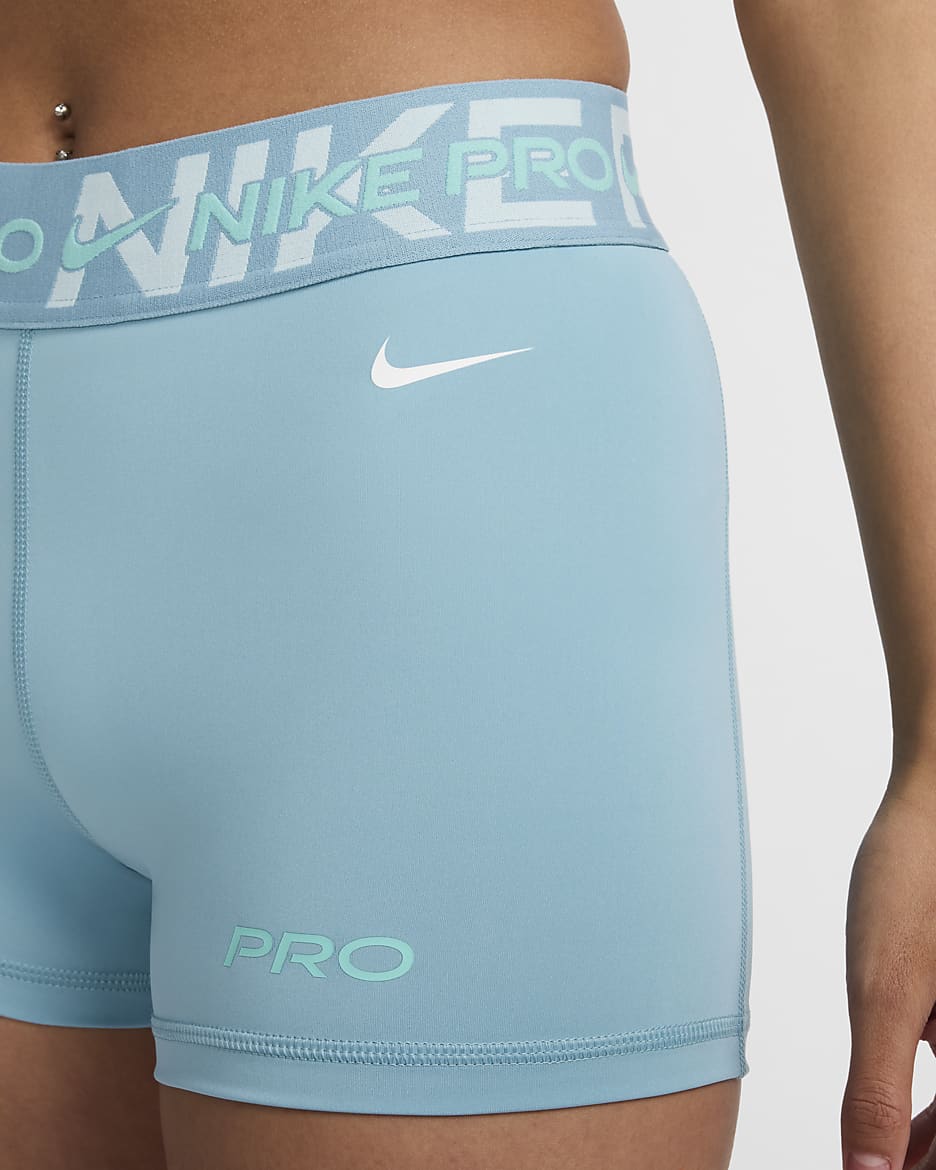 Shorts de ciclismo con gráfico de tiro medio de 8 cm para mujer Nike Pro - Denim turquesa/Azul glacial/Escarcha verde/Blanco