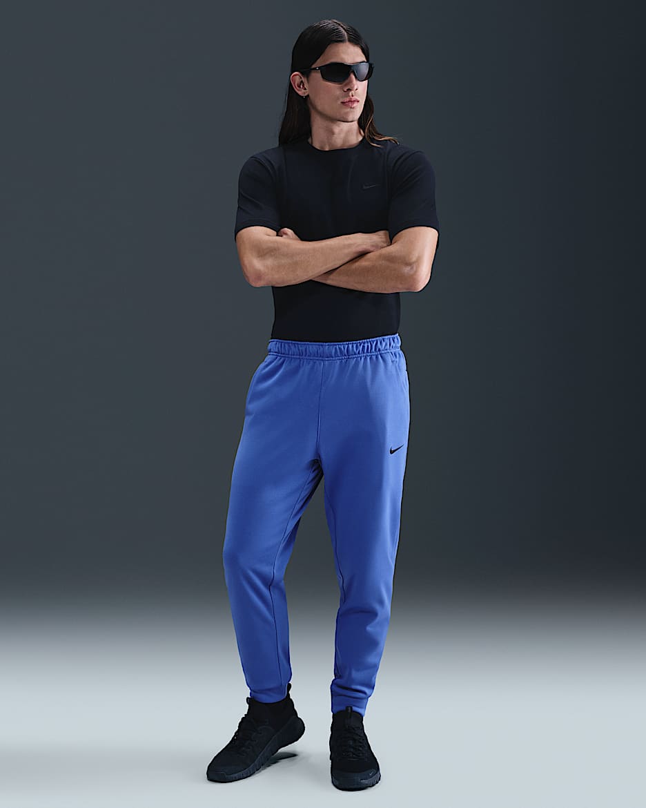 Calças de fitness afuniladas Therma-FIT Nike Therma para homem - Azul Comet/Azul Comet/Preto