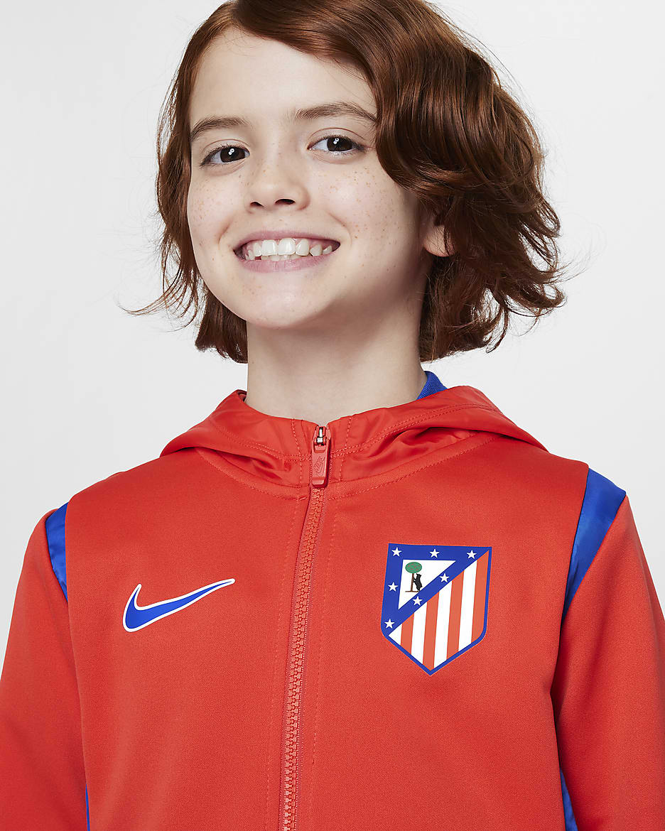 Atlético Madrid Home Older Kids' Nike Football Woven Tracksuit - Light Crimson/Game Royal/Game Royal