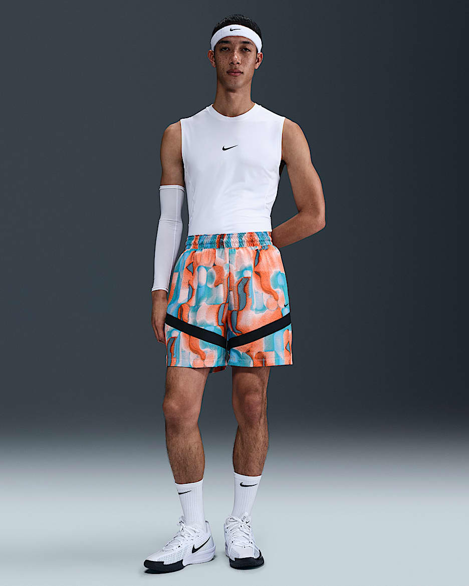 Shorts de básquetbol Dri-FIT de 15 cm para hombre Nike Icon - Coral lavado/Azul universitario/Negro/Negro