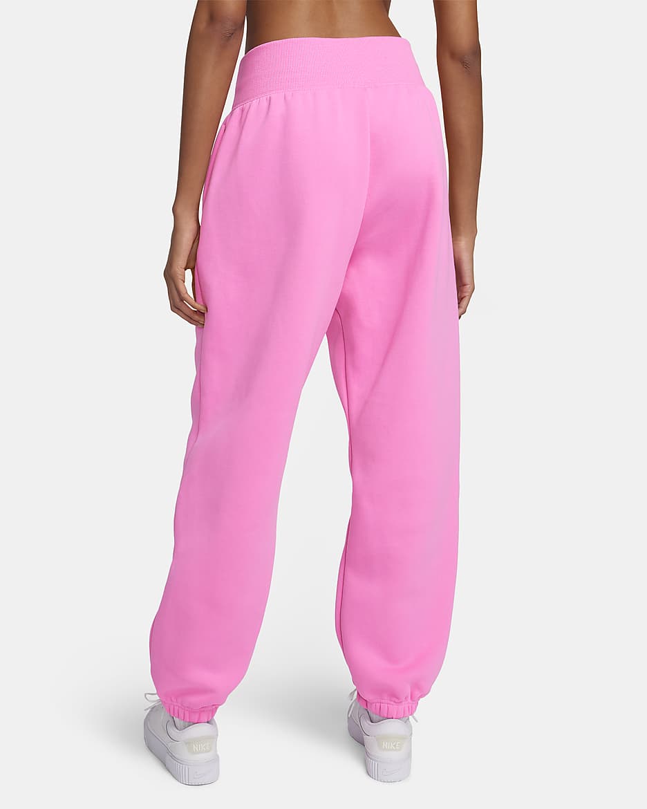 Pants de entrenamiento oversized de tiro alto para mujer Nike Sportswear Phoenix Fleece - Rosa alegre/Negro