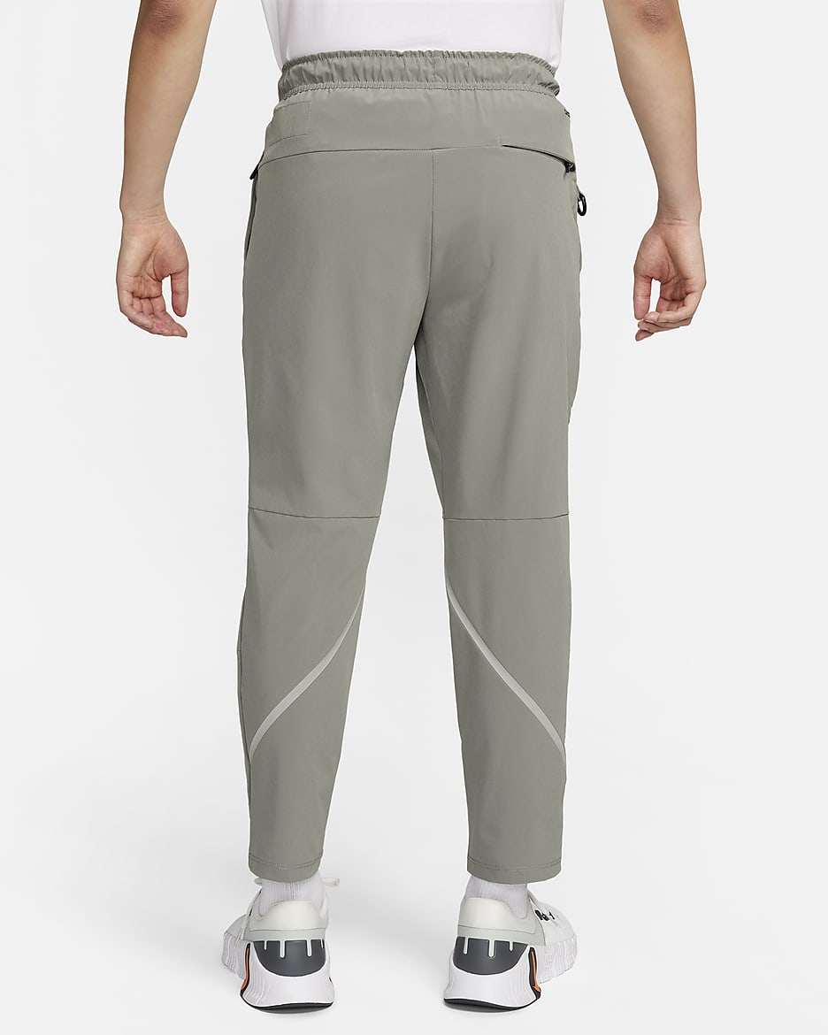 Nike Unlimited Men's Dri-FIT Tapered-Leg Pants - Dark Stucco/Light Orewood Brown/Light Orewood Brown/Dark Stucco