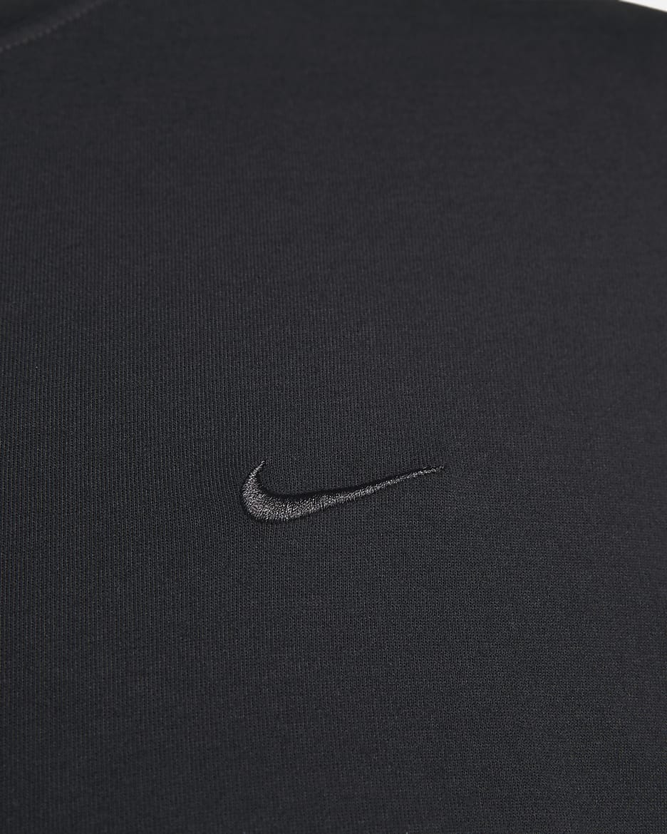 Nike Primary vielseitiges Nike Dri-FIT Kurzarm-Oberteil für Herren - Schwarz/Schwarz