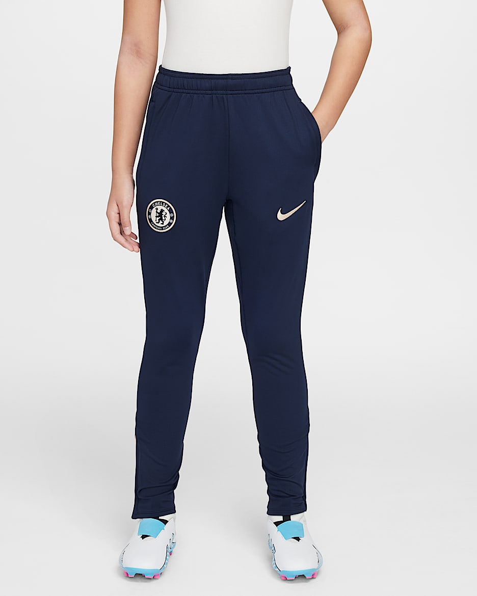 Pantaloni da calcio in maglia Nike Dri-FIT Chelsea FC Strike Special Edition – Ragazzo/a - Ossidiana/Apricot Agate/Guava Ice