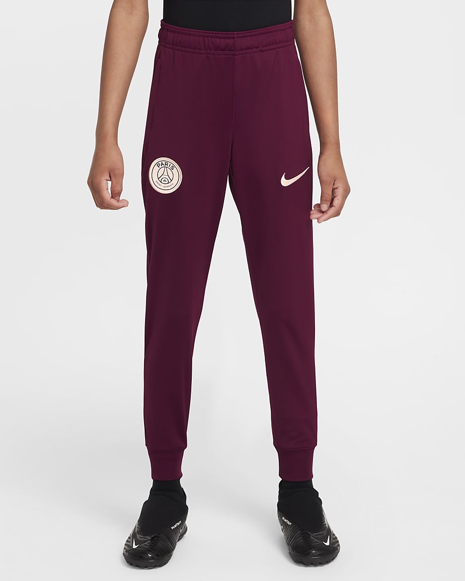 Paris Saint-Germain Strike Older Kids' Nike Dri-FIT Football Knit Tracksuit - Geode Teal/Bordeaux/Guava Ice