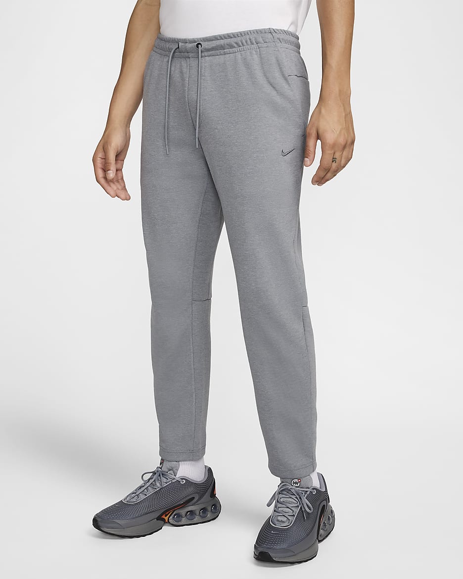 Pants de alto rendimiento Dri-FIT de pierna entallada con protección UV para hombre Nike Primary Fleece - Gris azulado/Jaspeado/Gris azulado