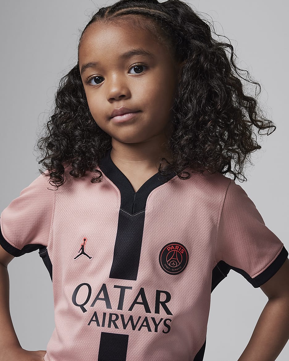 Divisa da calcio replica in 3 pezzi Jordan Paris Saint-Germain 2024/25 Stadium per bambino/a – Terza - Rust Pink/Nero/Nero