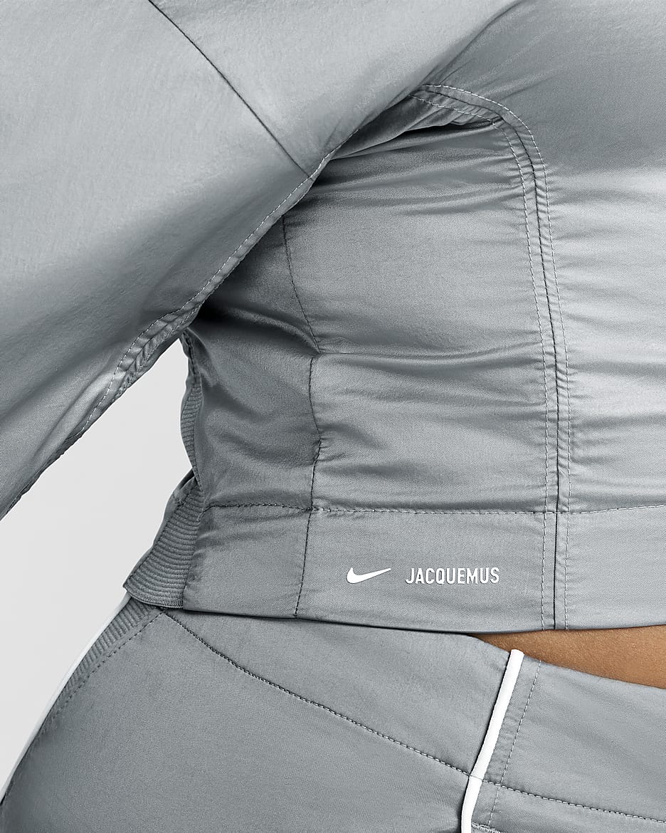 Nike x Jacquemus-løbejakke til kvinder - Particle Grey/hvid