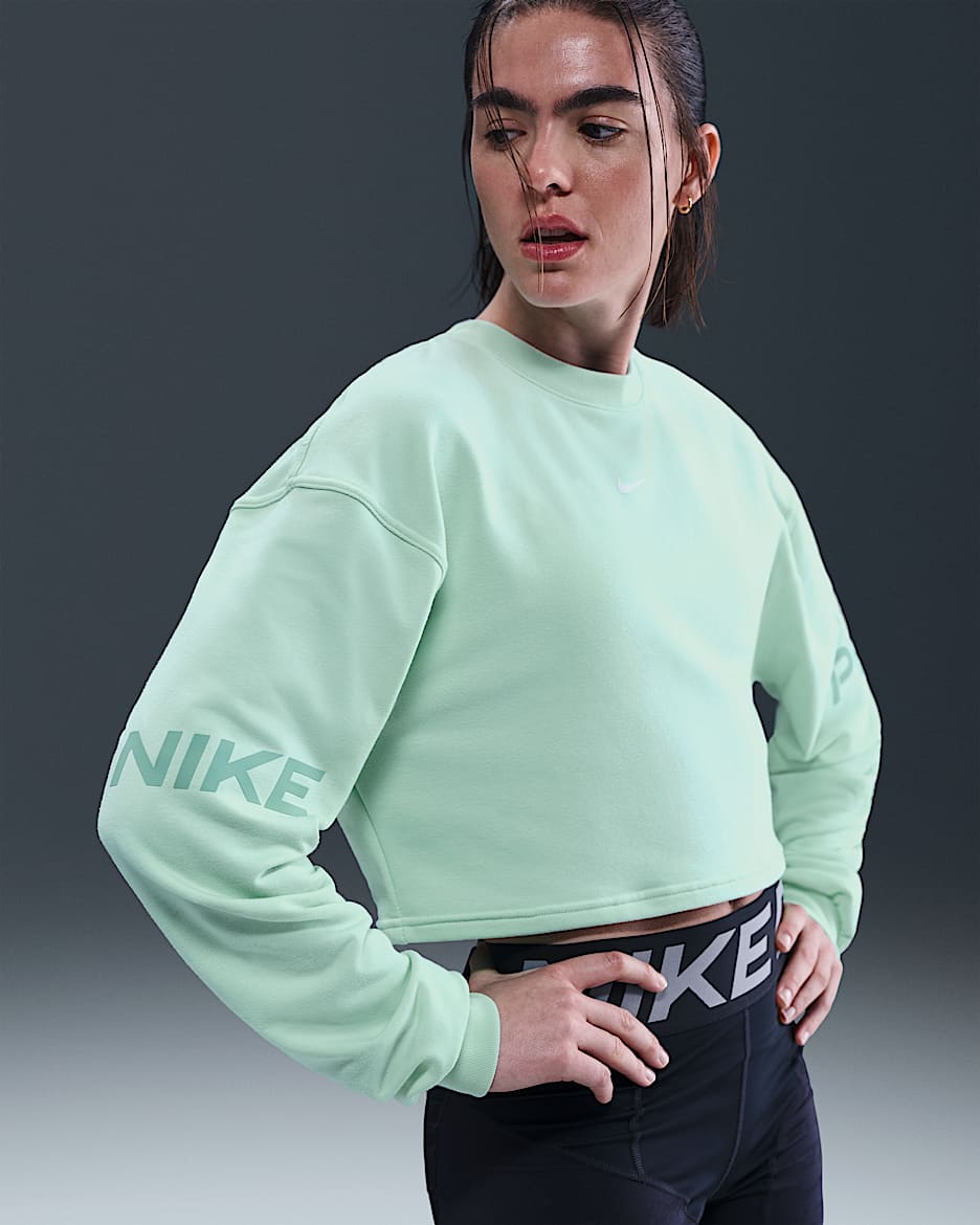 Sudadera de cuello redondo de tejido French Terry Dri-FIT holgada para mujer Nike Pro - Espuma menta/Cañón/Blanco