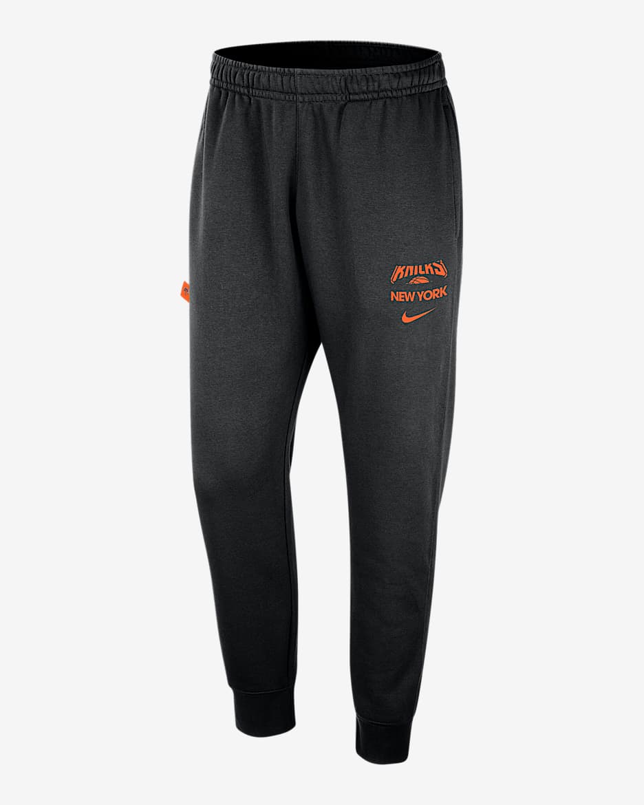 Joggers Nike de la NBA para hombre New York Knicks Club Courtside - Negro/Naranja brillante