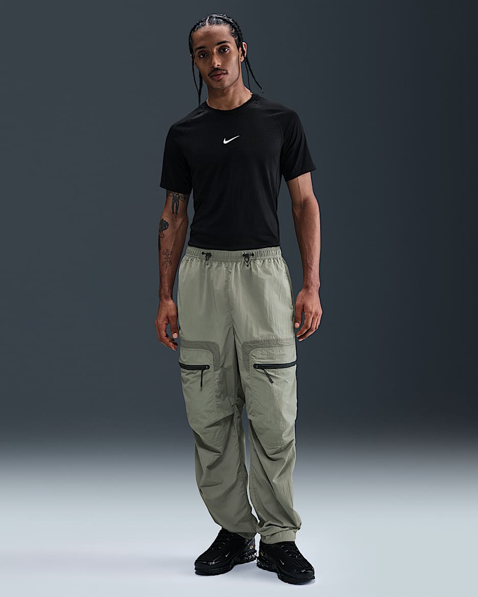 Pants cargo de tejido Woven para hombre Nike Tech - Militar claro/Negro
