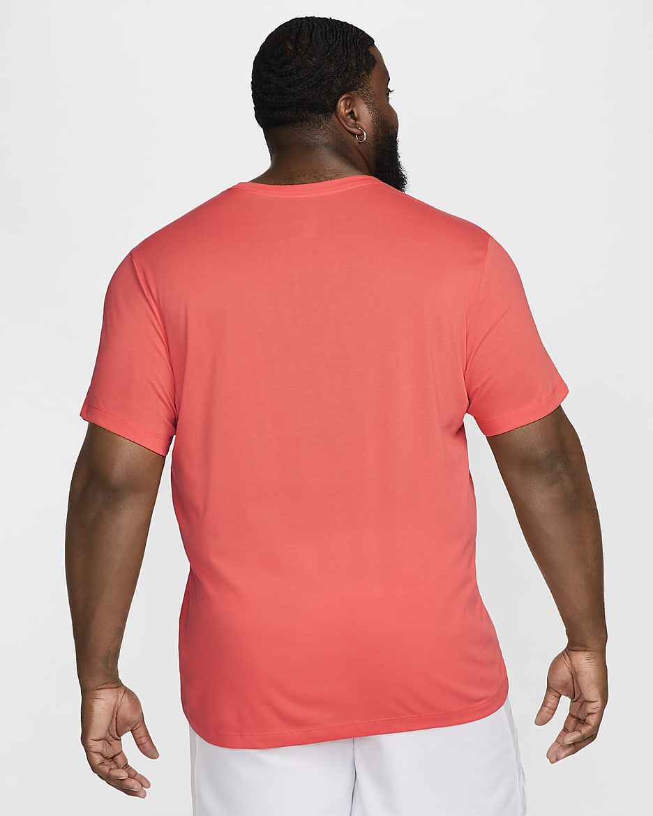 NikeCourt Camiseta de tenis Dri-FIT - Hombre - Light Wild Mango