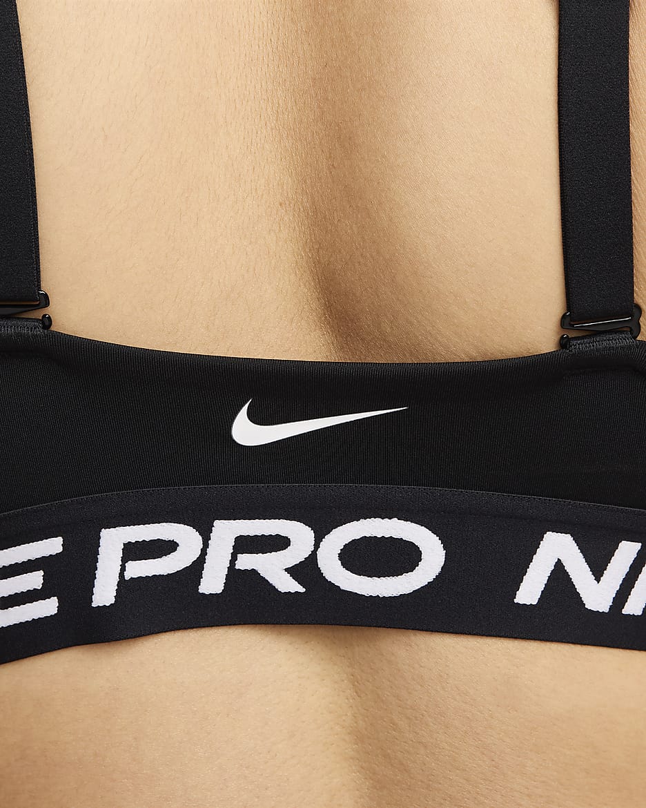 Dámská sportovní podprsenka Nike Pro Indy Plunge s vycpávkami a střední oporou - Černá/Bílá