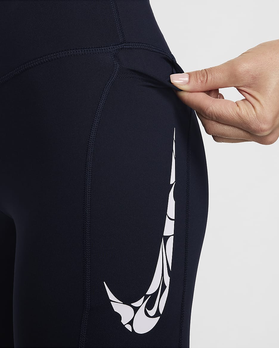 Damskie legginsy 7/8 ze średnim stanem i kieszeniami do biegania Nike Fast - Obsidian/Biel