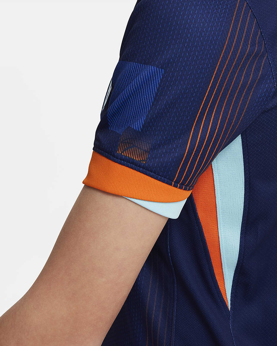 Segona equipació Stadium Països Baixos (selecció masculina) 2024/25 Samarreta de futbol Replica Nike Dri-FIT - Nen/a - Blue Void/Safety Orange/Copa/Blanc