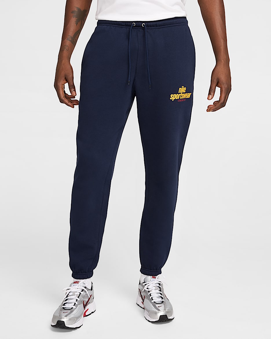 Pants de tejido Fleece para hombre Nike Club - Obsidiana/Obsidiana/Oro universitario